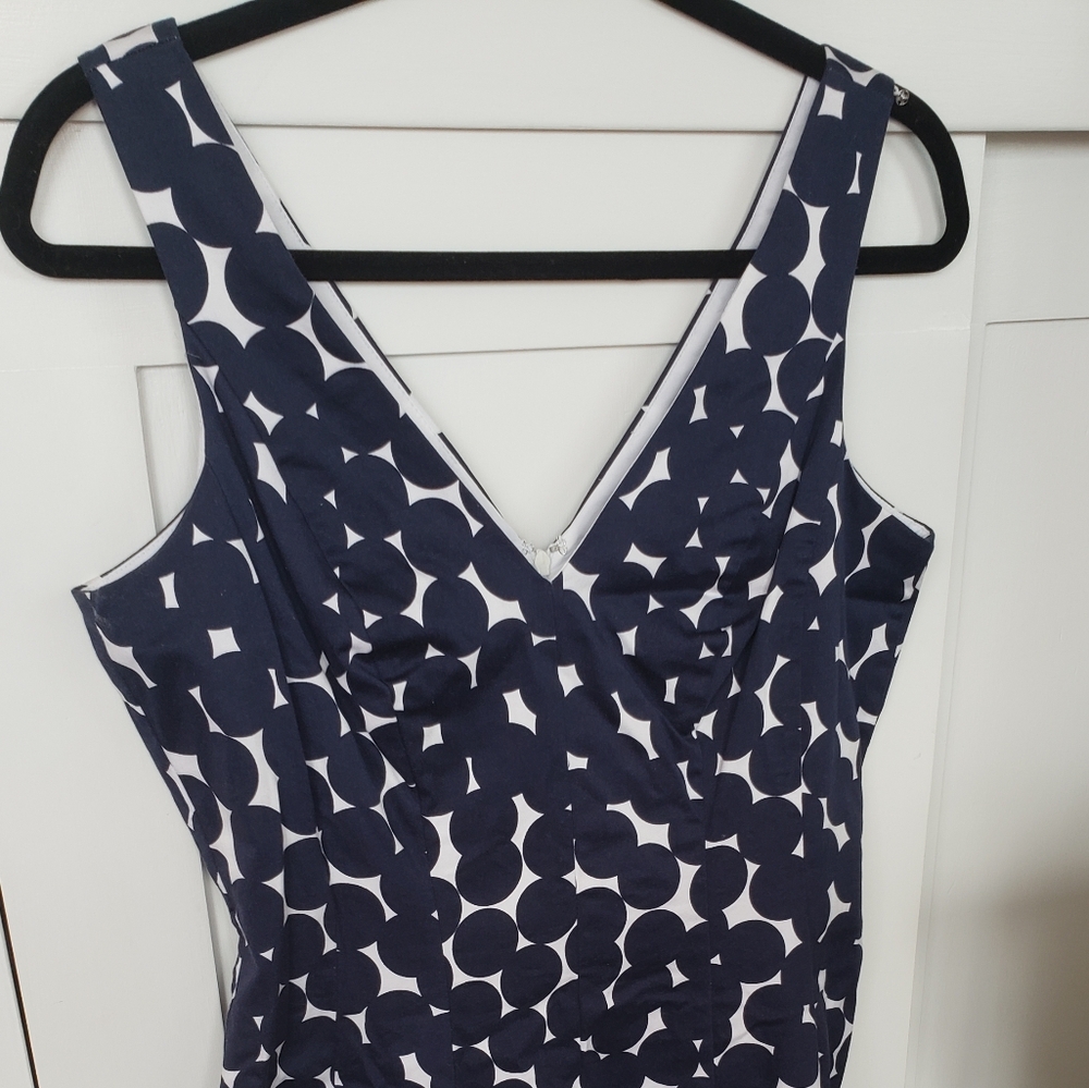 Sleeveless navy blue and white, large dotted, v-neck, wash and wear dress